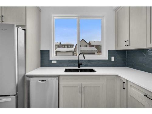 631 Rangeview Street Se, Calgary, AB - Indoor Photo Showing Kitchen With Double Sink