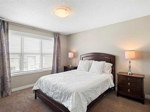 12 Sage Bank Road Nw, Calgary, AB - Indoor Photo Showing Bedroom