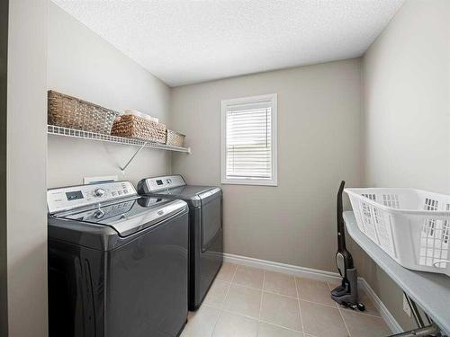 12 Sage Bank Road Nw, Calgary, AB - Indoor Photo Showing Laundry Room