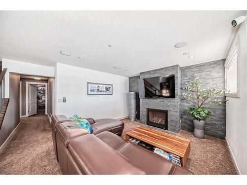 181 Muirfield Boulevard, Lyalta, AB - Indoor Photo Showing Living Room With Fireplace