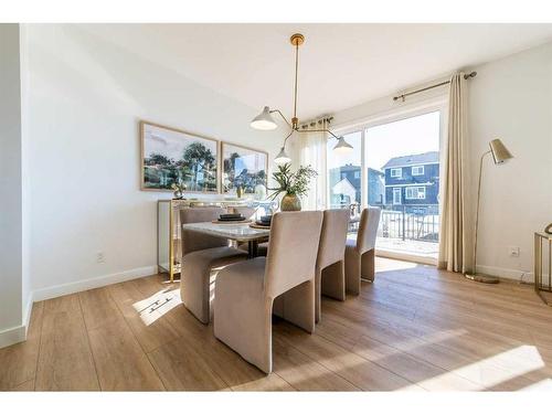 927 Langholm Drive Se, Airdrie, AB - Indoor Photo Showing Dining Room