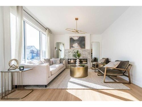 927 Langholm Drive Se, Airdrie, AB - Indoor Photo Showing Living Room