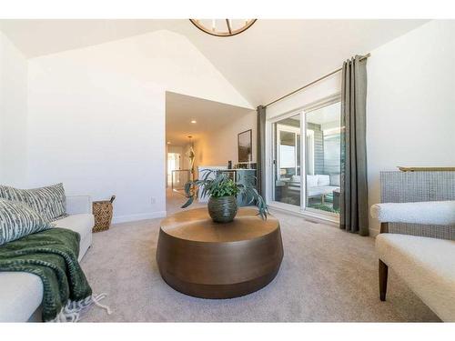 927 Langholm Drive Se, Airdrie, AB - Indoor Photo Showing Living Room