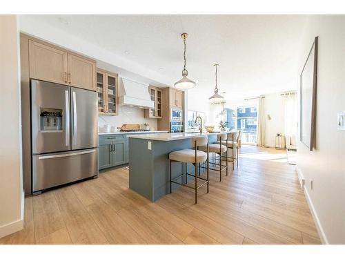 927 Langholm Drive Se, Airdrie, AB - Indoor Photo Showing Kitchen With Stainless Steel Kitchen With Upgraded Kitchen