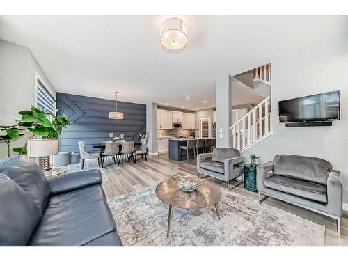 136 Creekstone Square Sw, Calgary, AB - Indoor Photo Showing Living Room