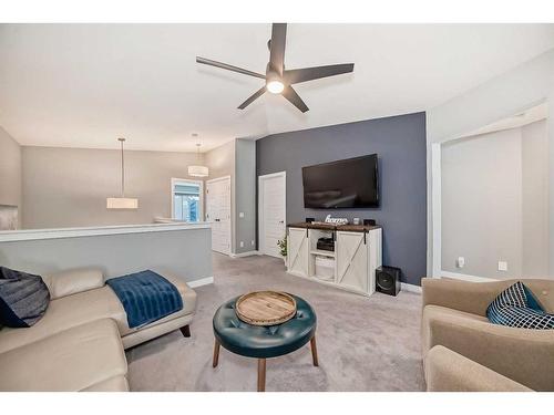 136 Creekstone Square Sw, Calgary, AB - Indoor Photo Showing Living Room