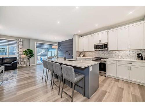 136 Creekstone Square Sw, Calgary, AB - Indoor Photo Showing Kitchen With Upgraded Kitchen