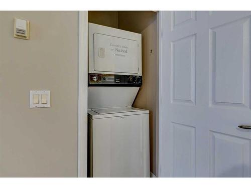 208-495 78 Avenue Sw, Calgary, AB - Indoor Photo Showing Laundry Room