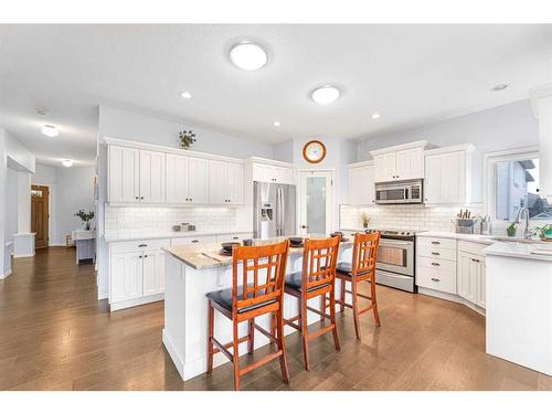 108 West Pointe Manor, Cochrane, AB - Indoor Photo Showing Kitchen With Upgraded Kitchen