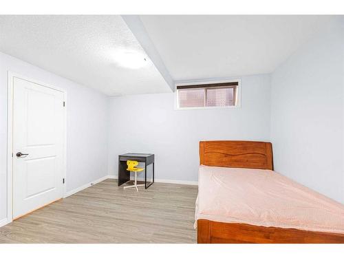 108 West Pointe Manor, Cochrane, AB - Indoor Photo Showing Bedroom