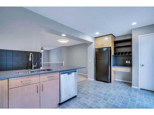 326 Toscana Gardens Nw, Calgary, AB - Indoor Photo Showing Kitchen With Double Sink