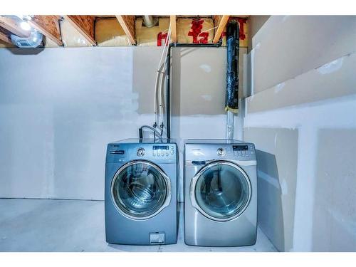 326 Toscana Gardens Nw, Calgary, AB - Indoor Photo Showing Laundry Room