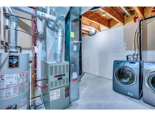 326 Toscana Gardens Nw, Calgary, AB - Indoor Photo Showing Laundry Room