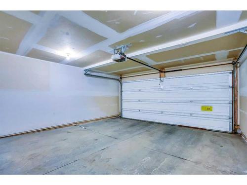 326 Toscana Gardens Nw, Calgary, AB - Indoor Photo Showing Garage