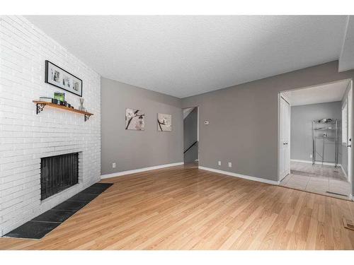 12-287 Southampton Drive Sw, Calgary, AB - Indoor With Fireplace