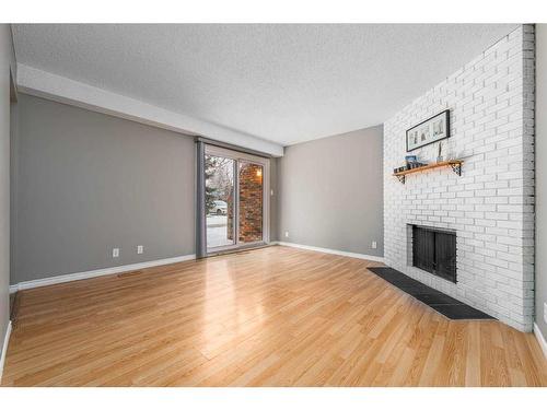 12-287 Southampton Drive Sw, Calgary, AB - Indoor With Fireplace