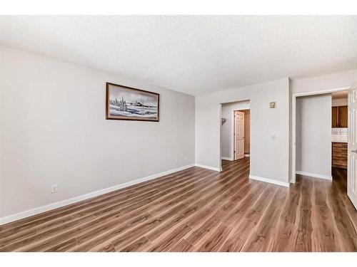 1313-928 Arbour Lake Road Nw, Calgary, AB - Indoor Photo Showing Other Room