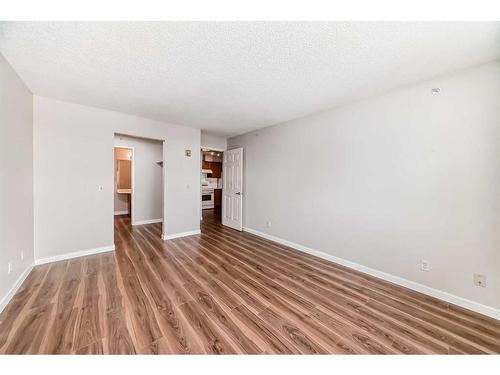 1313-928 Arbour Lake Road Nw, Calgary, AB - Indoor Photo Showing Other Room