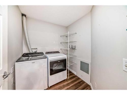 1313-928 Arbour Lake Road Nw, Calgary, AB - Indoor Photo Showing Laundry Room