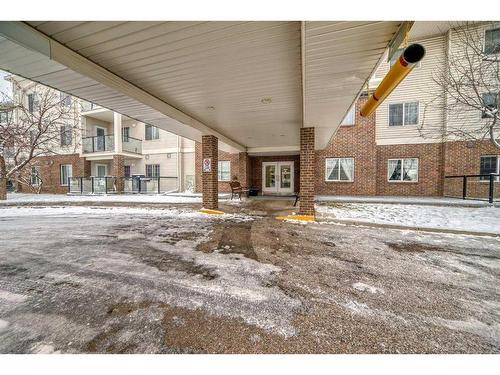 1313-928 Arbour Lake Road Nw, Calgary, AB - Outdoor