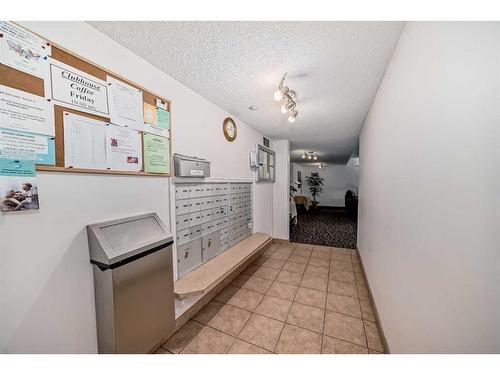 1313-928 Arbour Lake Road Nw, Calgary, AB - Indoor Photo Showing Other Room