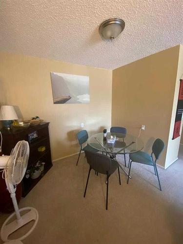 105-4944 Dalton Drive Nw, Calgary, AB - Indoor Photo Showing Other Room