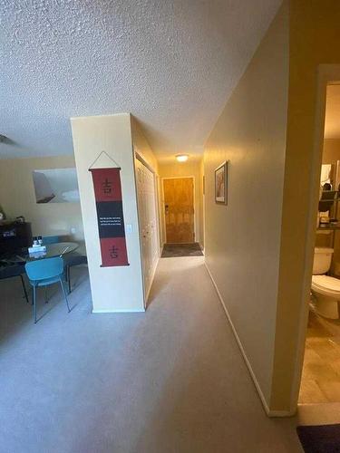 105-4944 Dalton Drive Nw, Calgary, AB - Indoor Photo Showing Other Room