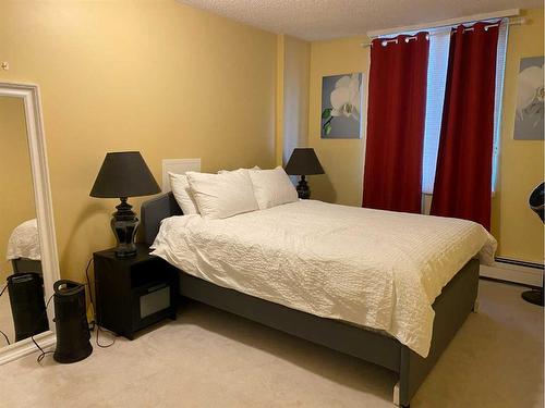 105-4944 Dalton Drive Nw, Calgary, AB - Indoor Photo Showing Bedroom