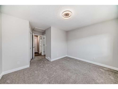 1180 Kings Heights Road Se, Airdrie, AB - Indoor Photo Showing Other Room