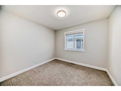 1180 Kings Heights Road Se, Airdrie, AB - Indoor Photo Showing Other Room