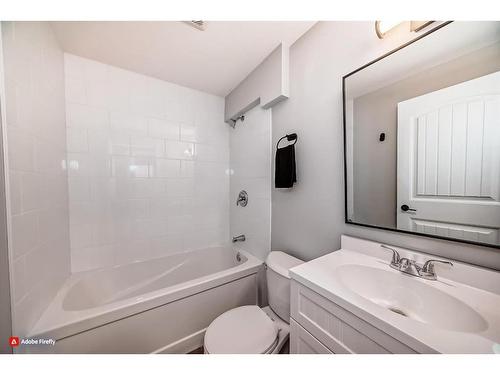 1180 Kings Heights Road Se, Airdrie, AB - Indoor Photo Showing Bathroom