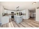 1180 Kings Heights Road Se, Airdrie, AB  - Indoor Photo Showing Kitchen 