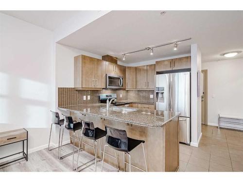 1807-210 15 Avenue Se, Calgary, AB - Indoor Photo Showing Kitchen With Double Sink