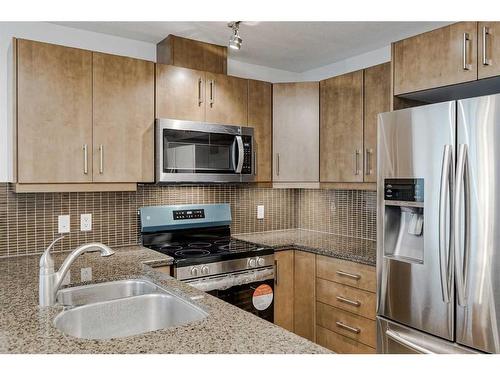 1807-210 15 Avenue Se, Calgary, AB - Indoor Photo Showing Kitchen With Double Sink With Upgraded Kitchen