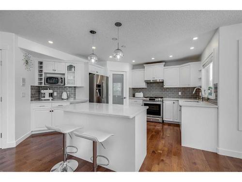 110 Cougarstone Terrace Sw, Calgary, AB - Indoor Photo Showing Kitchen With Upgraded Kitchen