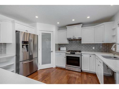 110 Cougarstone Terrace Sw, Calgary, AB - Indoor Photo Showing Kitchen With Double Sink