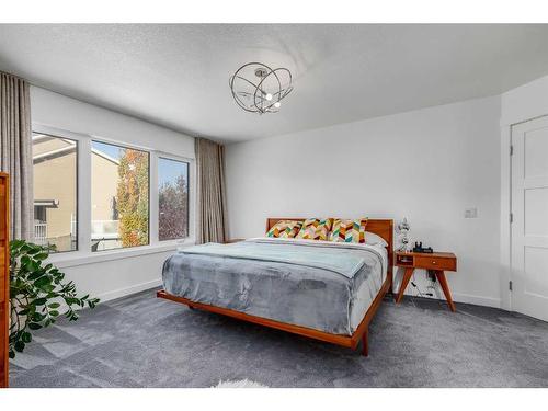 110 Cougarstone Terrace Sw, Calgary, AB - Indoor Photo Showing Bedroom