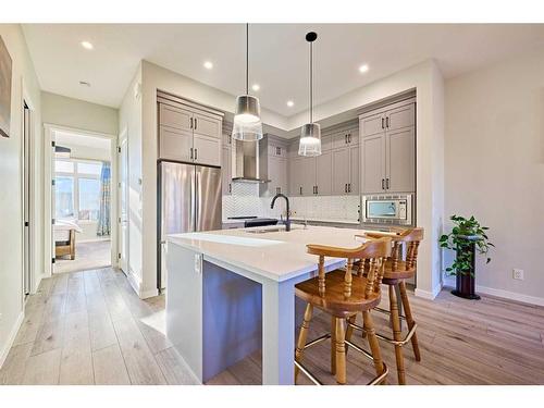 565 Marine Drive Se, Calgary, AB - Indoor Photo Showing Kitchen With Upgraded Kitchen