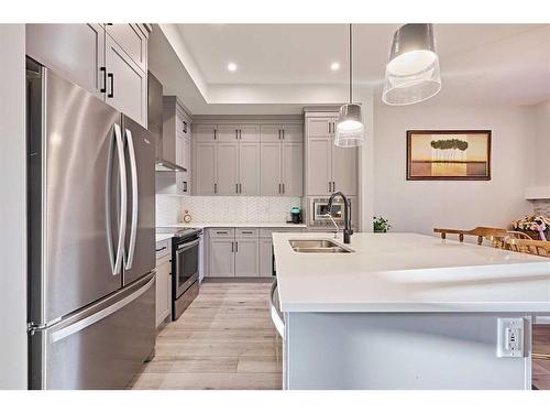 565 Marine Drive Se, Calgary, AB - Indoor Photo Showing Kitchen With Double Sink With Upgraded Kitchen