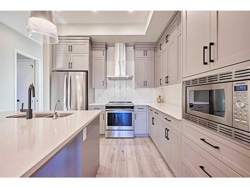 565 Marine Drive Se, Calgary, AB - Indoor Photo Showing Kitchen With Double Sink With Upgraded Kitchen