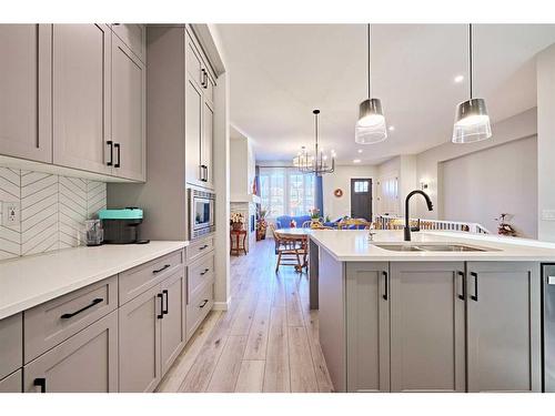 565 Marine Drive Se, Calgary, AB - Indoor Photo Showing Kitchen With Double Sink With Upgraded Kitchen