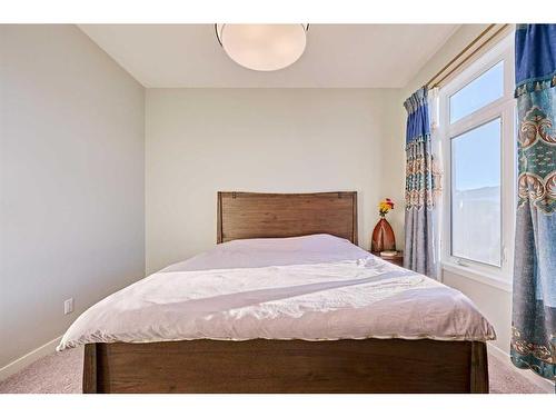 565 Marine Drive Se, Calgary, AB - Indoor Photo Showing Bedroom