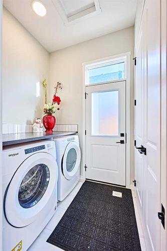 565 Marine Drive Se, Calgary, AB - Indoor Photo Showing Laundry Room