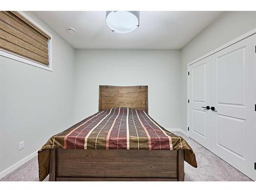 565 Marine Drive Se, Calgary, AB - Indoor Photo Showing Bedroom