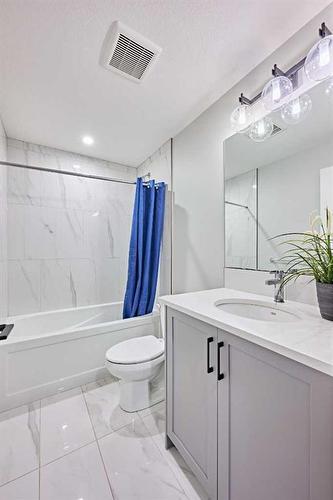 565 Marine Drive Se, Calgary, AB - Indoor Photo Showing Bathroom