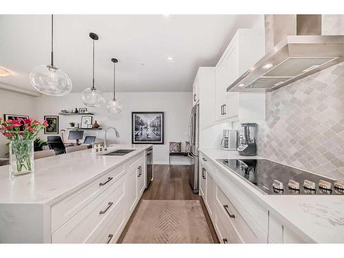 108-35 Walgrove Walk Se, Calgary, AB - Indoor Photo Showing Kitchen With Double Sink With Upgraded Kitchen