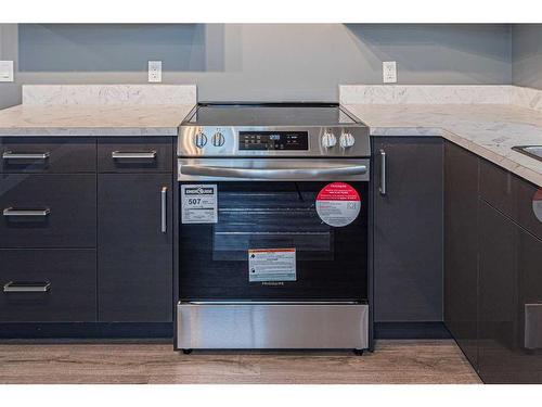 203 Falshire Way Ne, Calgary, AB - Indoor Photo Showing Kitchen