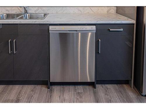 203 Falshire Way Ne, Calgary, AB - Indoor Photo Showing Kitchen With Double Sink