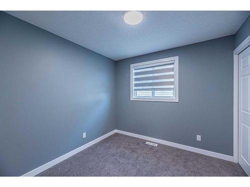 203 Falshire Way Ne, Calgary, AB - Indoor Photo Showing Other Room