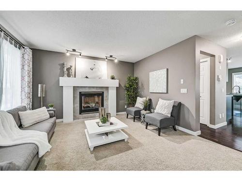 61 Skyview Springs Crescent Ne, Calgary, AB - Indoor Photo Showing Living Room With Fireplace